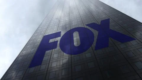 Fox Broadcasting Company logo on a skyscraper facade reflecting clouds Stock Illustration