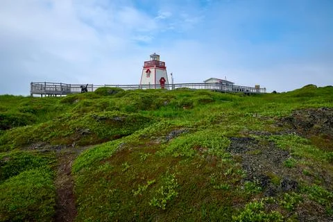 Fox Point Lighthouse in St. Anthony, Newfoundland. Stock Photos