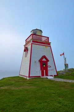 Fox Point Lighthouse in St. Anthony, Newfoundland. Stock Photos