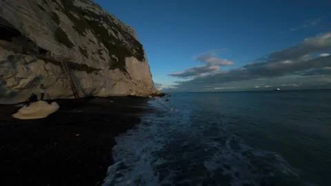 FPV Aerial Drone View of the White Cliffs of Dover at Sunset 스톡 동영상 325523421