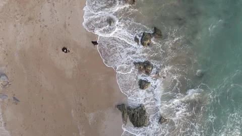FPV Aerial Overhead View of Romantic Couple on Sandy Beach – 4K Drone Footage Stock Footage 319919768