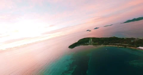 FPV aerial view of sunset over the ocean in Fiji. Stock Footage 344971604