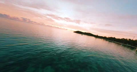 FPV aerial view of sunset over the ocean, Fiji. Stock Footage 344971631