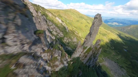 FPV, Beautiful view of rocky peak of Spitz mountain in the Carpathian mountains Stock Footage 250193142