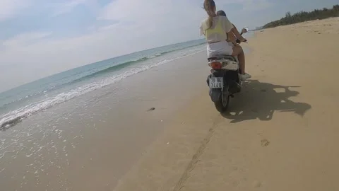 Fpv camera flies after two girls on a motorcycle Video stock 237731293