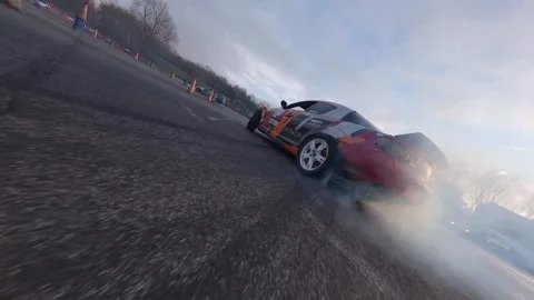FPV Chase: Smooth Red Mazda RX-8 Drift at Milovice Track Stock Footage 324922543