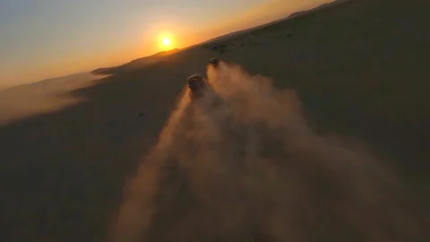 FPV chasing Buggy to sunset 库存影片 164187619