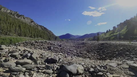 FPV Cinematic Flyover: Yankee Fork River Rock Tailings – Mining Environmental Im Stock Footage 332132156