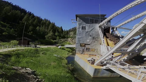 FPV Cinematic Orbit: Abandoned Yankee Fork Gold Dredge – Idaho Mining History Stock Footage 332134377