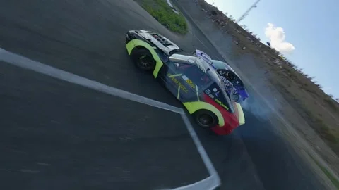 FPV Close-Up Drift Battle Featuring BMW and Nissan in Milovice Stock Footage 328177957