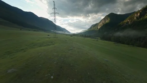 The FPV copter flies low to the trees. Hills covered with green trees, turbulent 스톡 동영상 278369249