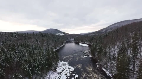 Fpv cross over mountain river gorge Stock Footage 321178373