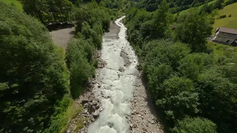 FPV Dive to Alpine River Followed by Low Flight – Swiss Mountains Stock Footage 313004350