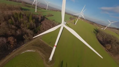 FPV Dive and Rise Wind Turbine – Cinematic Energy Shot (4K) Stock Footage 311599670