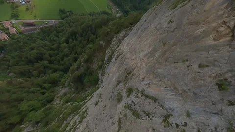 FPV Dive Down Mountain Near Interlaken – Cinematic Drone Footage (4K) Stock Footage 311757722
