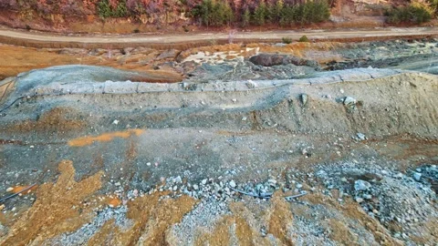 FPV Dive Slow Motion Through Sand Hills Mine Clay Natural Resource Video stock 274133481