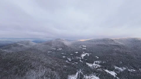 Fpv drift above snowy hill curves Stock Footage 321178666