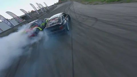 FPV Drift Battle Capturing Close Proximity and Tire Smoke in Milovice Stock Footage 328178551