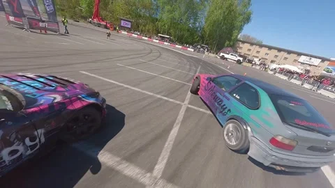 FPV Drift Battle With Low and Front-Facing Angles Stock Footage 328471515