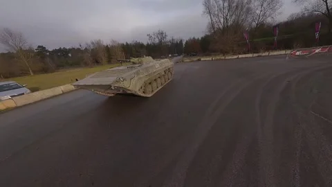 FPV Drift Battle: Van and BMW Combi Near Tank at Milovice Stock Footage 324921865