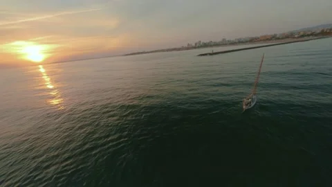 FPV Drone Aerial flight sunset view at Praia da Rocha, Algarve. Portugal. (C) Stock Footage 163367907