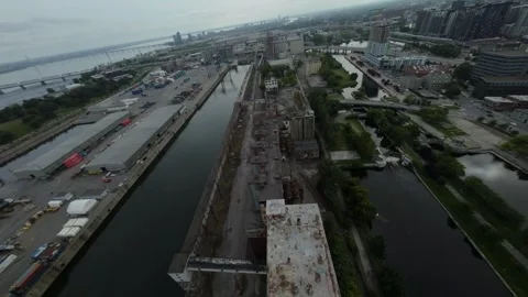 FPV drone birdseye view over old building and cityscape, descending at Silo 51 Stock Footage 300166467