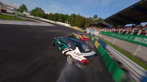 FPV Drone Chase of Tandem Drift on Wet Track at Golden Hour Stock Footage 336101498