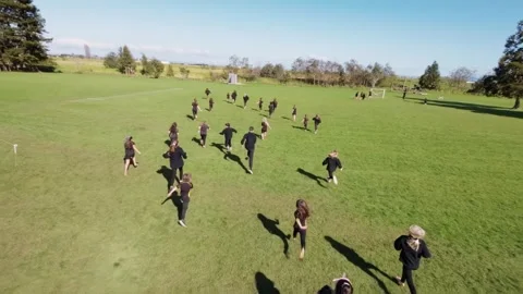 FPV Drone Chasing Kids at Elementary School - Fun Stock Footage 284481942