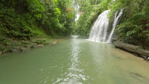 Fpv drone cinewhoop, river to waterfall Stock Footage 248209435