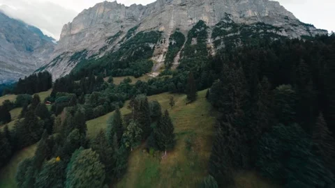 Fpv drone climbing the Mattenberg in Grindelwald Switzerland cinematic drone Stock Footage 255502085