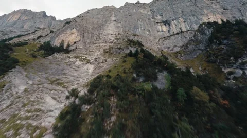 Fpv drone climbing the Mattenberg in Grindelwald Switzerland cinematic drone Stock Footage 255502385