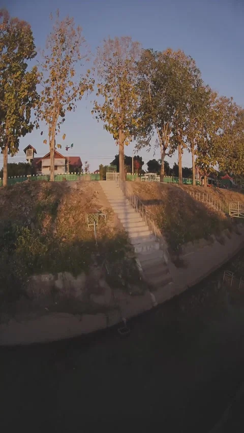FPV Drone Dance Over Thai Village Canals: Sunset Landing Stock Footage 305460329
