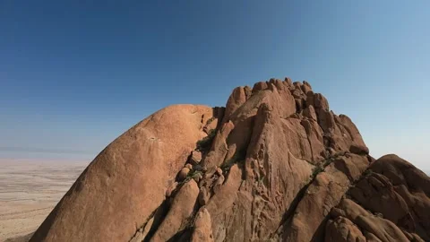 FPV Drone Descending Over Spitzkoppe Mountain, Namibia Stock Footage 339749115