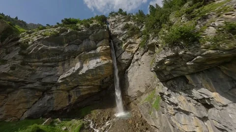 FPV Drone Dive Along Mountain Waterfall near Oeschinensee (4K) Stock Footage 312008312