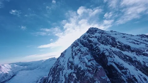 FPV Drone Dive Down Snowy Segla Mountain – Senja Norway 5K GoPro 11 Clip Stock Footage 287000822