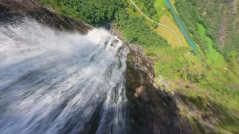FPV Drone Dive Down Waterfall in Norway – Epic Cinematic Nature Shot Stock Footage 305803859