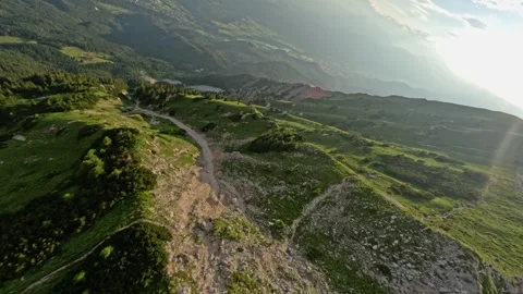 FPV Drone Dive Low Proximity Fast Flying Over Mountain Slope, 4K Stock Footage 321200442