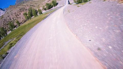 FPV drone dive over the bridge in Altai between the rocks. Shadow visible Stock Footage 166059440
