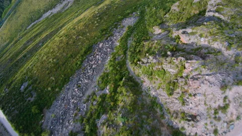 FPV drone dive over a rocky river in Altai between the rocks Stock Footage 166059477