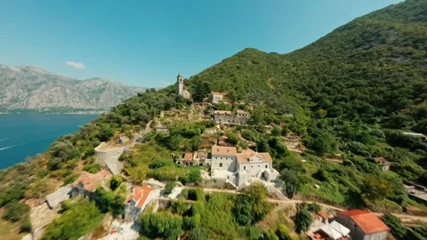 FPV Drone Dive Past Chapel in Bay of Kotor, Montenegro Stock Footage 305805581