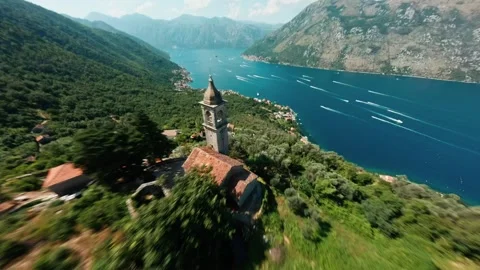 FPV Drone Dive Past Chapel in Bay of Kotor, Montenegro Video stock 305805827
