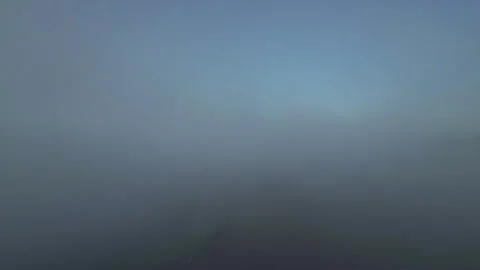 FPV Drone Dive Through Thick Blue Fog Cloud Stock Footage 306315834