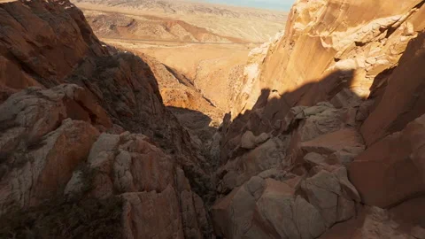 FPV drone diving a desert canyon  - fast, dramatic shot of unearthly landscape Stock Footage 165036802
