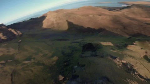 FPV drone diving over rock face, close to cliffs drone aerial 4K Stock Footage 104576659