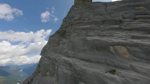 FPV Drone Exploring Mountain Summit in the Swiss Alps Stock Footage 313074117