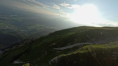 FPV Drone Fast Flight Over Summer Alpine Ridge, 4K Stock Footage 321200413