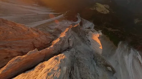 FPV drone flies close to the mountain surface of Seceda Mountain. Italy Stock Footage 307863731