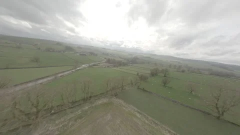 FPV drone flies down Peak District Limestone dale Stock Footage 271143960