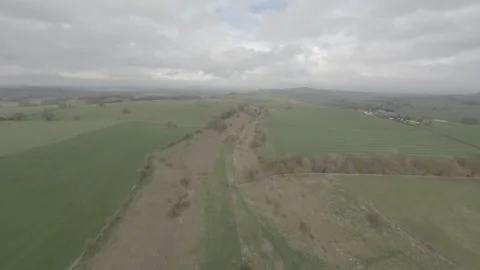 FPV drone flies high over the Springtime Peak District Stock Footage 271143533