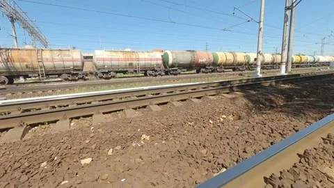 Fpv The drone flies quickly under the freight train cars Stock Footage 229529038